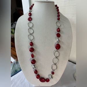 Long abstract style red and silvertone statement necklace